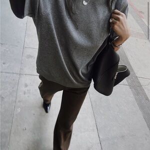 Toteme Relaxed twisted trousers pepper